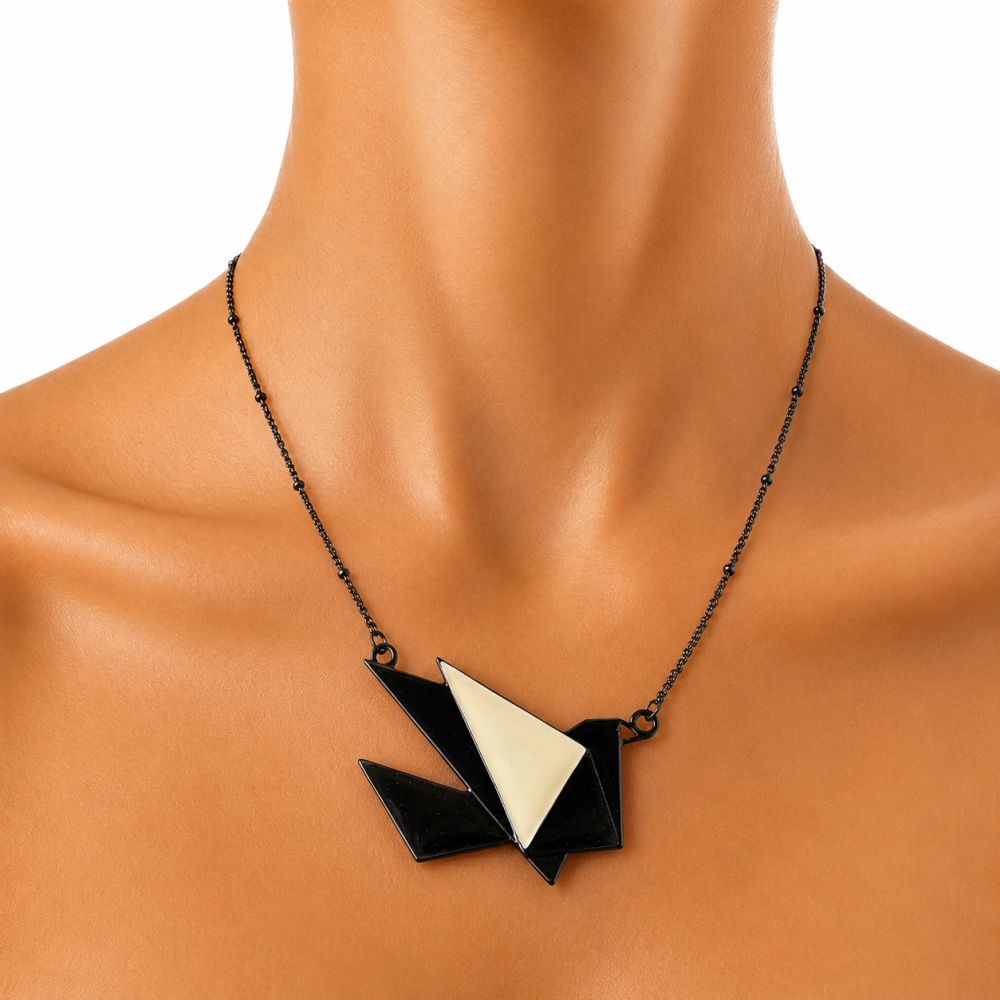 Collier Oiseau Noir et Ivoire IKITA - bijou unique